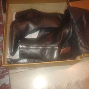 Angle heeled black boots size 11 wide